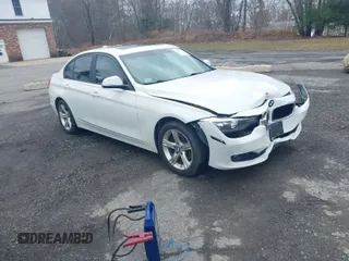2015 BMW 3 Series 328i xDrive with VIN WBA3B5G50FNS15117, listed as a IAAI auction lot 41843496 with 144,613 mi miles. Bid and sale history available at carsss.com. Image 1.