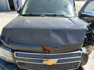 2014 Chevrolet Suburban LT with VIN 1GNSCJE04ER156583, listed as a Copart auction lot 73730364 with 243,131 mi miles and Clean Title. Bid and sale history available at carsss.com. Image 12.