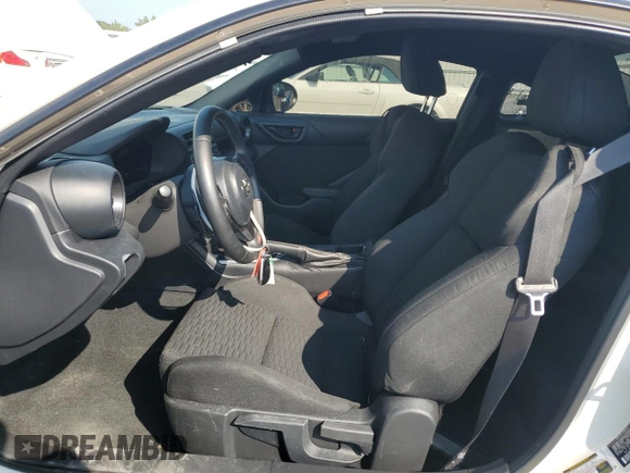 2023 Toyota GR86 with VIN JF1ZNBC11P8757595, listed as a Copart auction lot 69376574 with 34,450 mi miles and Salvage Title. Bid and sale history available at carsss.com. Image 7.