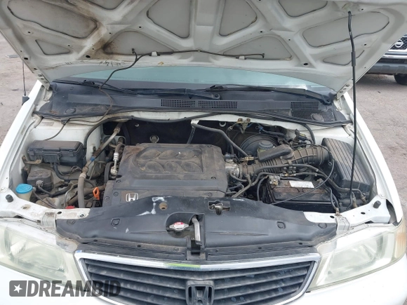 2001 Honda Odyssey EX z VIN 2HKRL18661H566973, wystawiony jako IAAI lot #42117015 z przebiegiem 206 999 mil mil oraz . Historia ofert i sprzedaży dostępna na DreamBid. Obrazek 10.