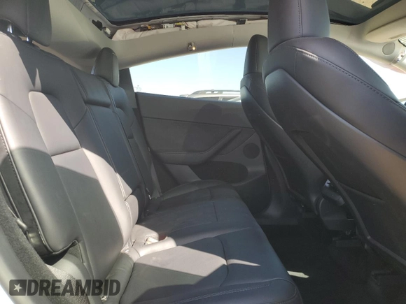 2024 Tesla Model Y Long Range with VIN 7SAYGDEE0RF081948, listed as a Copart auction lot 52612805 with 12,099 mi miles and Salvage Title. Bid and sale history available at DreamBid. Image 10.