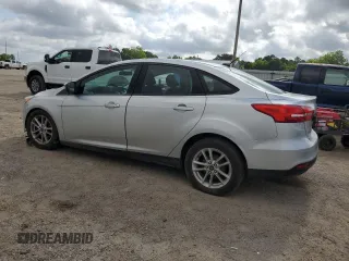 2017 Ford Focus SE with VIN 1FADP3F23HL328312, listed as a Copart auction lot 57028125 with 116,498 mi miles and Salvage title. Bid and sale history available at DreamBid. Image 2.
