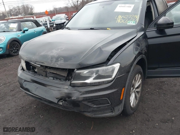 2018 Volkswagen Tiguan S with VIN 3VV1B7AX9JM091210, listed as a IAAI auction lot 41683380 with 63,627 mi miles. Bid and sale history available at carsss.com. Image 17.