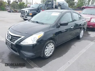 2016 Nissan Versa S Plus with VIN 3N1CN7AP7GL857242, listed as a IAAI auction lot 42135656 with 138,627 mi miles. Bid and sale history available at carsss.com. Image 2.