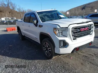 2021 GMC Sierra 1500 AT4 with VIN 3GTP9EEL1MG405564, listed as a IAAI auction lot 41214073 with 49,114 mi miles. Bid and sale history available at carsss.com. Image 1.