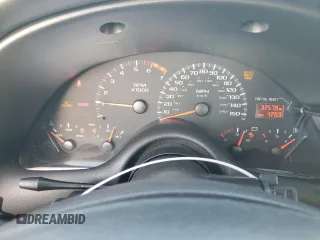 2000 Chevrolet Camaro Z28 z VIN 2G1FP22G3Y2123001, wystawiony jako Copart lot #85730994 z przebiegiem 32 579 mil mil oraz Szkoda całkowita • Salvage title. Historia ofert i sprzedaży dostępna na DreamBid. Obrazek 9.