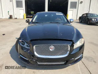 2015 Jaguar XJ with VIN SAJWA1CZ7F8V83167, listed as a Copart auction lot 74991144 with 94,502 mi miles and Salvage Title. Bid and sale history available at carsss.com. Image 5.