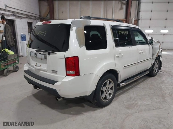 2011 Honda Pilot Touring with VIN 5FNYF4H93BB084167, listed as a IAAI auction lot 41715897 with 151,014 mi miles. Bid and sale history available at carsss.com. Image 4.