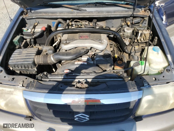 2002 Suzuki Grand Vitara JLX with VIN JS3TD62V424152230, listed as a Copart auction lot 74657294 with 160,135 mi miles and Salvage Title. Bid and sale history available at carsss.com. Image 12.
