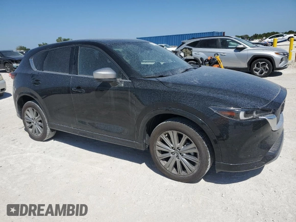 2024 Mazda CX-5 2.5 Turbo Signature with VIN JM3KFBXY2R0354346, listed as a Copart auction lot 49260525 with 9,571 mi miles and Salvage Title. Bid and sale history available at carsss.com. Image 4.