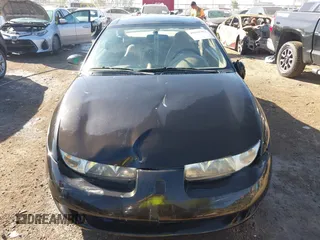 1997 Saturn SC z VIN 1G8ZE1283VZ163658, wystawiony jako IAAI lot #40494467 z przebiegiem 111 701 mil mil oraz . Historia ofert i sprzedaży dostępna na DreamBid. Obrazek 12.
