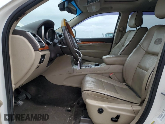 2011 Jeep Grand Cherokee Overland with VIN 1J4RR6GT9BC696319, listed as a Copart auction lot 56914185 with 211,661 mi miles and Salvage title. Bid and sale history available at DreamBid. Image 7.