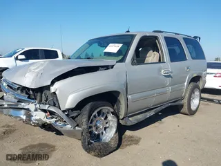 2004 Chevrolet Tahoe LS with VIN 1GNEC13T64J282970, listed as a IAAI auction lot 41879458 with 205,952 mi miles. Bid and sale history available at carsss.com. Image 14.