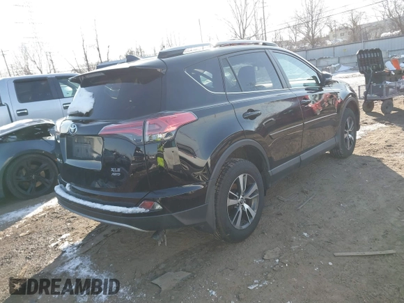 2018 Toyota RAV4 XLE with VIN 2T3RFREV1JW808773, listed as a IAAI auction lot 41595377 with 109,309 mi miles. Bid and sale history available at carsss.com. Image 4.