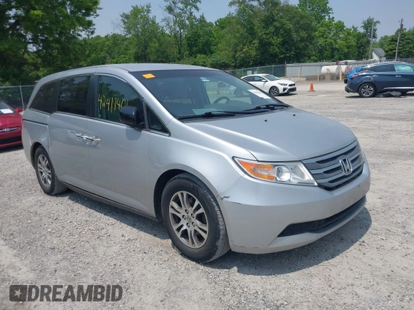2012 Honda Odyssey EX z VIN 5FNRL5H44CB038825, wystawiony jako IAAI lot #42411401 z przebiegiem 214 164 mil mil oraz . Historia ofert i sprzedaży dostępna na DreamBid. Obrazek 1.
