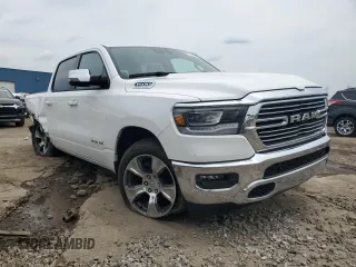 2023 Ram 1500 Laramie with VIN 1C6SRFJTXPN583434, listed as a Copart auction lot 61860925 with 28,064 mi miles and Clean title. Bid and sale history available at DreamBid. Image 4.