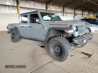 2020 Jeep Gladiator Mojave with VIN 1C6JJTEG1LL202459, listed as a Copart auction lot 79334434 with 49,515 mi miles and Salvage title. Bid and sale history available at DreamBid. Image 4.