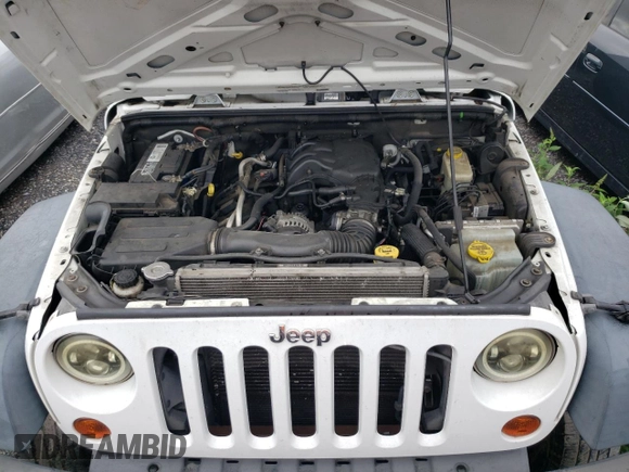 2013 Jeep Wrangler Unlimited Sport z VIN 1C4BJWDGXDL632315, wystawiony jako Copart lot #66711564 z przebiegiem 131 907 mil mil oraz Tytuł czysty. Historia ofert i sprzedaży dostępna na DreamBid. Obrazek 12.