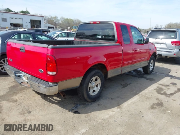 2003 Ford F-150 XL with VIN 1FTRX17W93NB27257, listed as a IAAI auction lot 41835994 with 216,905 mi miles. Bid and sale history available at carsss.com. Image 4.
