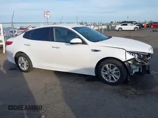 2016 Kia Optima LX with VIN 5XXGT4L34GG062691, listed as a IAAI auction lot 40743940 with 99,069 mi miles and . Bid and sale history available at DreamBid. Image 13.