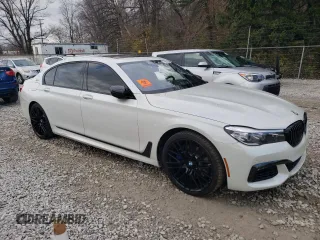 2017 BMW 7 Series 740e xDrive iPerformance with VIN WBA7J2C36HG497830, listed as a Copart auction lot 79948304 with 43,029 mi miles and Salvage Title. Bid and sale history available at carsss.com. Image 4.