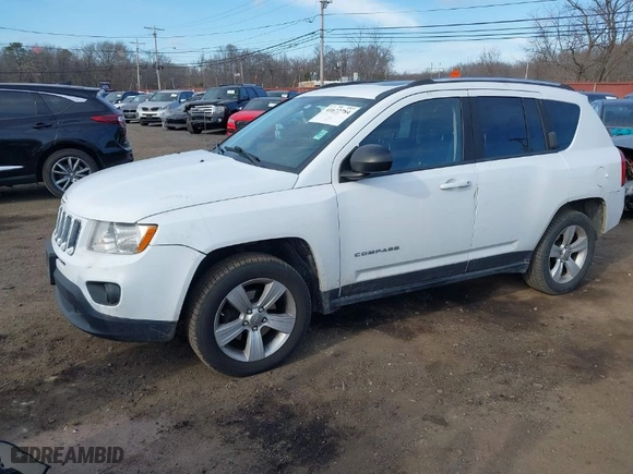 2012 Jeep Compass Latitude with VIN 1C4NJDEB5CD584509, listed as a IAAI auction lot 41672784 with 166,271 mi miles. Bid and sale history available at carsss.com. Image 2.