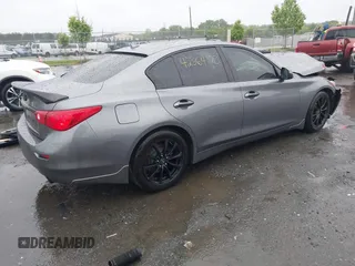 2015 Infiniti Q50 Premium with VIN JN1BV7APXFM358127, listed as a IAAI auction lot 42364173 with 97,512 mi miles and . Bid and sale history available at DreamBid. Image 4.