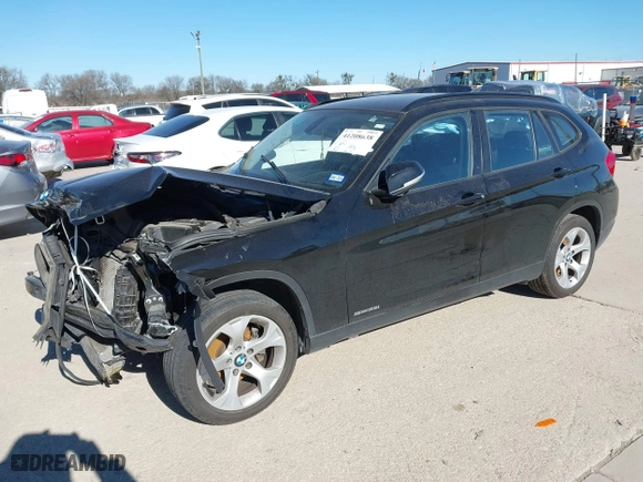 2015 BMW X1 sDrive28i with VIN WBAVM1C58FV498559, listed as a IAAI auction lot 41208638 with 100,452 mi miles. Bid and sale history available at carsss.com. Image 17.