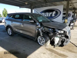 2019 Kia Sorento LX z VIN 5XYPGDA59KG463392, wystawiony jako Copart lot #54970245 z przebiegiem 99 576 mil mil oraz Szkoda całkowita • Salvage title. Historia ofert i sprzedaży dostępna na DreamBid. Obrazek 4.