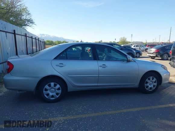 2004 Toyota Camry LE z VIN JTDBE32K040263783, wystawiony jako IAAI lot #42066013 z przebiegiem 204 531 mil mil oraz . Historia ofert i sprzedaży dostępna na DreamBid. Obrazek 13.