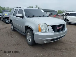 2011 GMC Yukon SLT z VIN 1GKS2CE05BR366374, wystawiony jako IAAI lot #42202289 z przebiegiem Nie podano mil oraz . Historia ofert i sprzedaży dostępna na DreamBid. Obrazek 1.