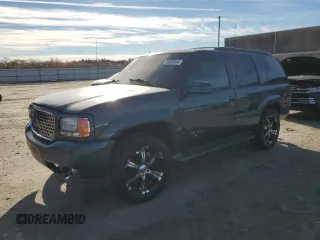 1999 GMC Denali with VIN 1GKEK13R3XR908307, listed as a Copart auction lot 78595094 with 138,098 mi miles and Salvage Title. Bid and sale history available at carsss.com. Image 1.