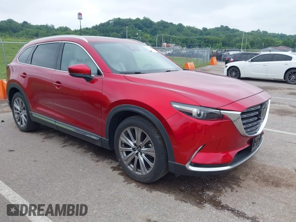 2021 Mazda CX-9 Signature with VIN JM3TCBEY9M0511928, listed as a IAAI auction lot 42231925 with 26,367 mi miles and . Bid and sale history available at DreamBid. Image 1.