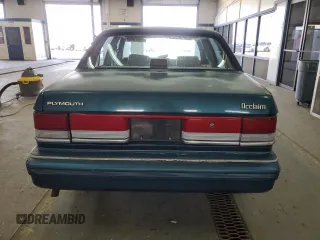 1994 Plymouth Acclaim z VIN 3P3AA46K7RT276936, wystawiony jako Copart lot #49509835 z przebiegiem 176 324 mil mil oraz Tytuł czysty. Historia ofert i sprzedaży dostępna na DreamBid. Obrazek 6.
