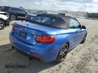 2015 BMW 2 Series M235i with VIN WBA1M1C53FV393104, listed as a Copart auction lot 71143703 with 12,025 mi miles. Bid and sale history available at carsss.com. Image 3.