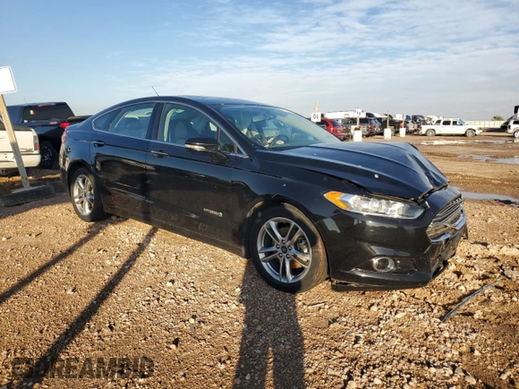 2016 Ford Fusion Titanium Hybrid with VIN 3FA6P0RU6GR356609, listed as a Copart auction lot 79803204 with 69,619 mi miles and Salvage Title. Bid and sale history available at carsss.com. Image 4.