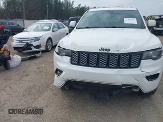 2017 Jeep Grand Cherokee Altitude with VIN 1C4RJEAG9HC736362, listed as a IAAI auction lot 41437181 with 125,346 mi miles and . Bid and sale history available at DreamBid. Image 13.