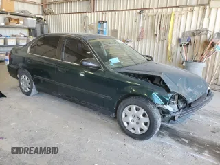 2000 Honda Civic LX with VIN JHMEJ6679YS005805, listed as a Copart auction lot 49810095 with 224,984 mi miles and Salvage Title. Bid and sale history available at DreamBid. Image 4.