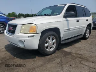 2003 GMC Envoy SLE z VIN 1GKDT13S732228585, wystawiony jako Copart lot #58764565 z przebiegiem 151 107 mil mil oraz Szkoda całkowita • Salvage title. Historia ofert i sprzedaży dostępna na DreamBid. Obrazek 1.