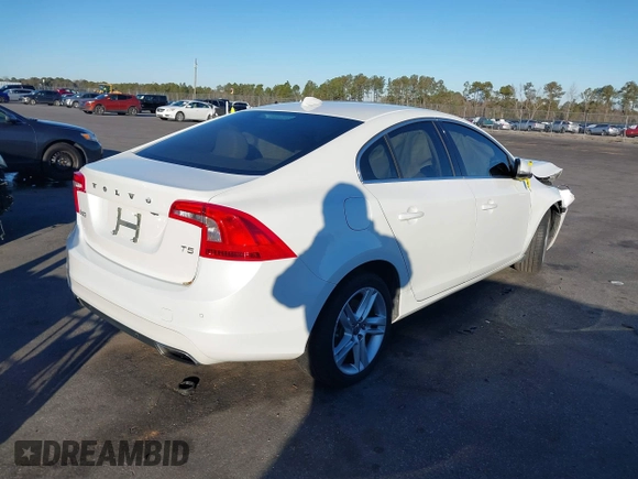 2015 Volvo S60 T5 Drive-E Premier Plus with VIN YV140MFC6F1314534, listed as a IAAI auction lot 41348374 with 81,235 mi miles. Bid and sale history available at carsss.com. Image 4.