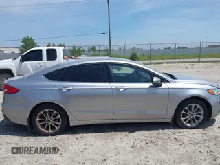 2020 Ford Fusion SE z VIN 3FA6P0HD6LR144501, wystawiony jako IAAI lot #42715066 z przebiegiem 204 983 mil mil oraz . Historia ofert i sprzedaży dostępna na DreamBid. Obrazek 13.