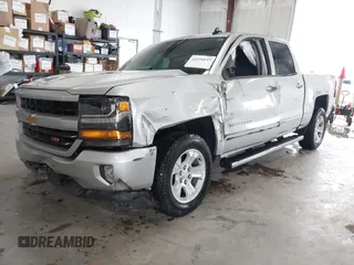 2017 Chevrolet Silverado 1500 LT with VIN 3GCUKREC2HG473554, listed as a IAAI auction lot 42220143 with 80,000 mi miles and . Bid and sale history available at DreamBid. Image 17.