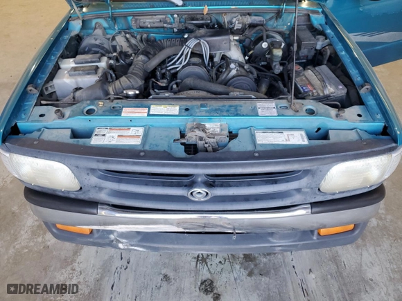 1996 Mazda B-Series 2WD Truck with VIN 4F4CR12A2TTM30539, listed as a Copart auction lot 82702234 with 115,724 mi miles and Salvage Title. Bid and sale history available at carsss.com. Image 11.