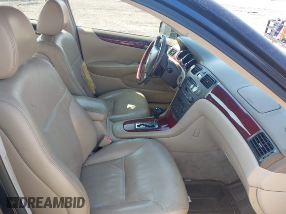 2002 Lexus ES 300 with VIN JTHBF30G020052297, listed as a IAAI auction lot 42630300 with 215,488 mi miles and . Bid and sale history available at DreamBid. Image 5.