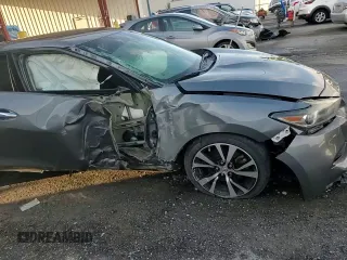 2018 Nissan Maxima SV with VIN 1N4AA6AP0JC390247, listed as a Copart auction lot 61824725 with 64,078 mi miles and Salvage title. Bid and sale history available at DreamBid. Image 13.