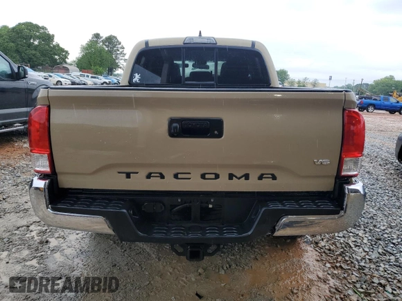 2017 Toyota Tacoma SR5 with VIN 5TFAZ5CN2HX030781, listed as a Copart auction lot 53957535 with 105,606 mi miles and Salvage Title. Bid and sale history available at DreamBid. Image 6.