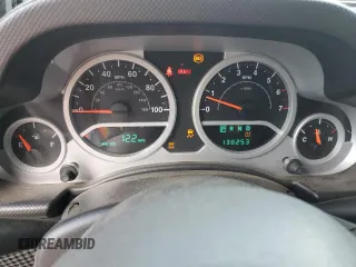 2010 Jeep Wrangler Unlimited Rubicon with VIN 1J4BA6H10AL176014, listed as a Copart auction lot 57092255 with 138,253 mi miles and Salvage title. Bid and sale history available at DreamBid. Image 9.