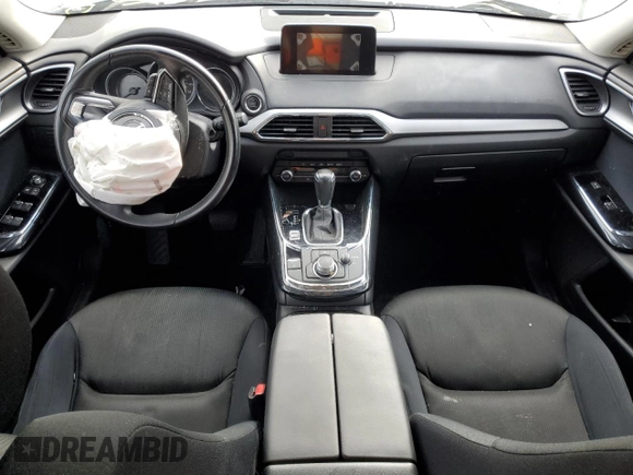2019 Mazda CX-9 Sport с VIN JM3TCABY2K0321285, выставлен на аукционе Copart как лот 85372004 с пробегом 57 423 миль миль и Списание • Salvage title. История ставок и продаж доступна на DreamBid. Изображение 8.