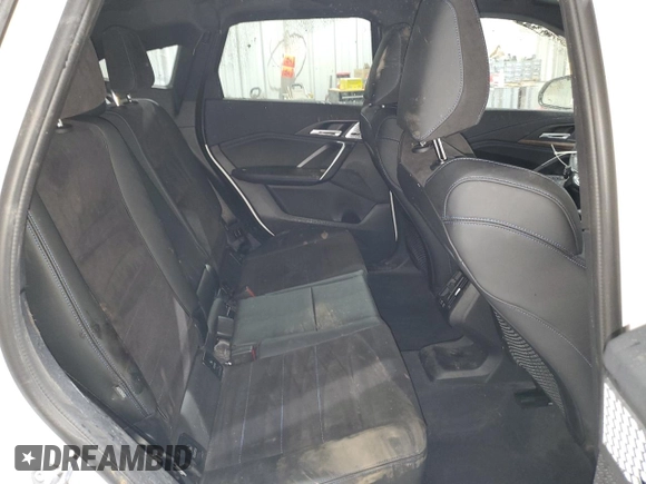 2023 BMW X1 xDrive28i with VIN WBX73EF08P5X60980, listed as a Copart auction lot 59899385 with 21,975 mi miles and Salvage title. Bid and sale history available at DreamBid. Image 11.