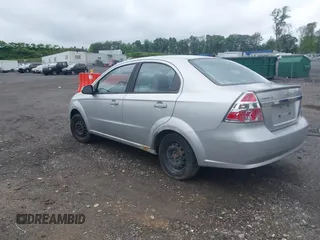 2009 Chevrolet Aveo 1LT z VIN KL1TD56E39B643484, wystawiony jako IAAI lot #42359233 z przebiegiem 88 974 mil mil oraz . Historia ofert i sprzedaży dostępna na DreamBid. Obrazek 3.